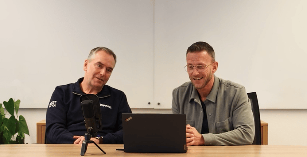Two ISPnext specialists at the table during the webinar on nextAI in AP Automation